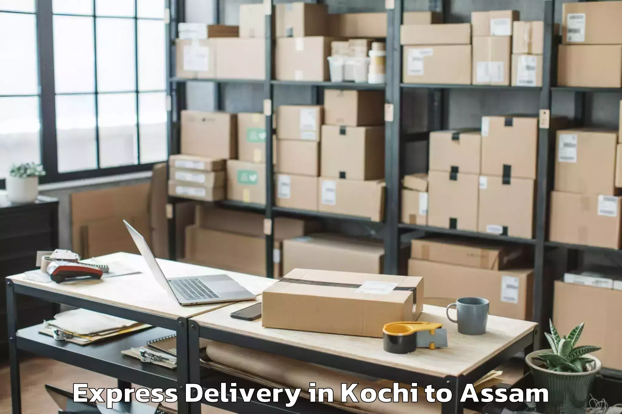 Get Kochi to Laharighat Express Delivery